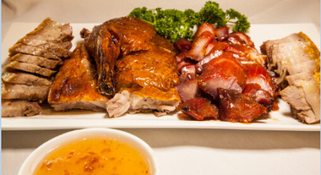 Combination of roast pork, bbq pork and roast duck